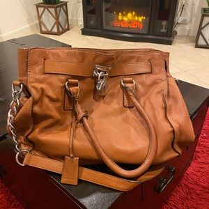 Michael Kors. Gorgeous tan leather with silver hardware.